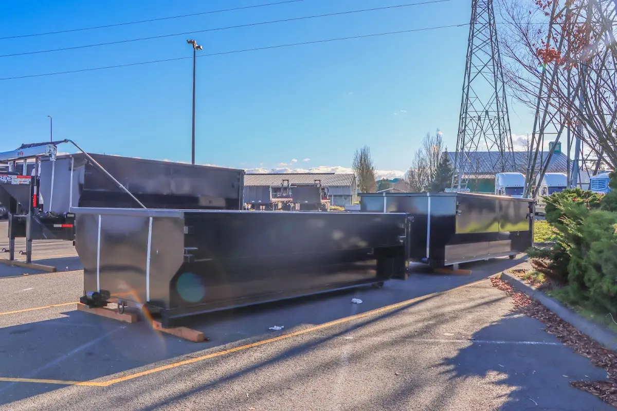 Roll-off dumpster ready for waste disposal at job site for Construction Dumpster Rental in Lemay
